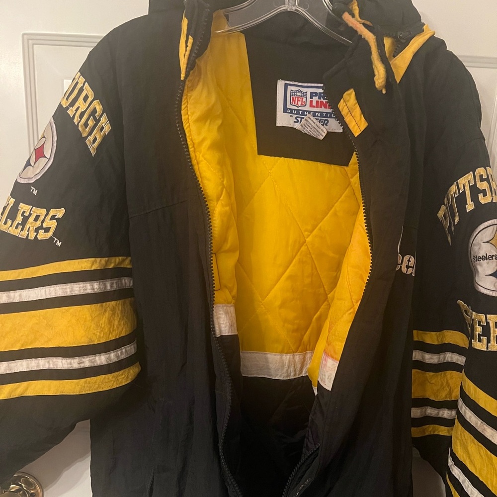 Vintage Steelers Starter Jacket with hood- size medium.
